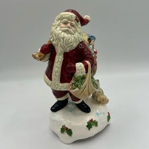 1992 Schmid Musical Collectibles; Santa with his bag of toys.